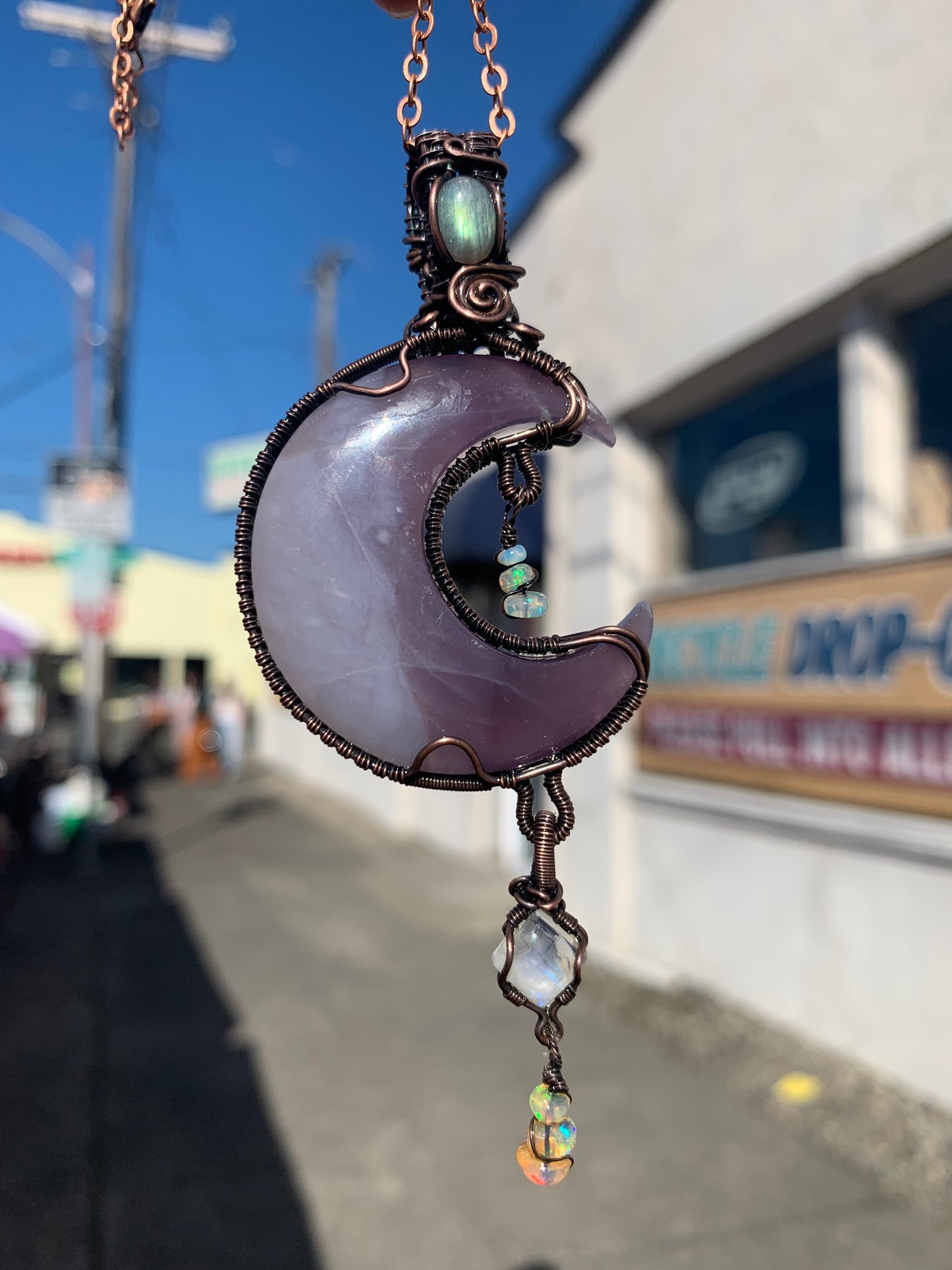 Purple Chalcedony Moon Pendant With Labradorite, Moonstone and Ethiopian Opals Wrapped in Antiqued Copper