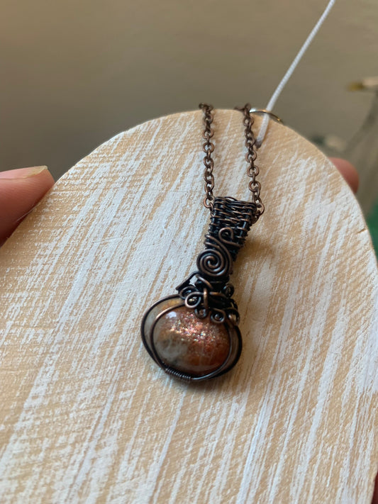 Dainty Sunstone Pumpkin Pendant Wire Wrapped In Antiqued Copper