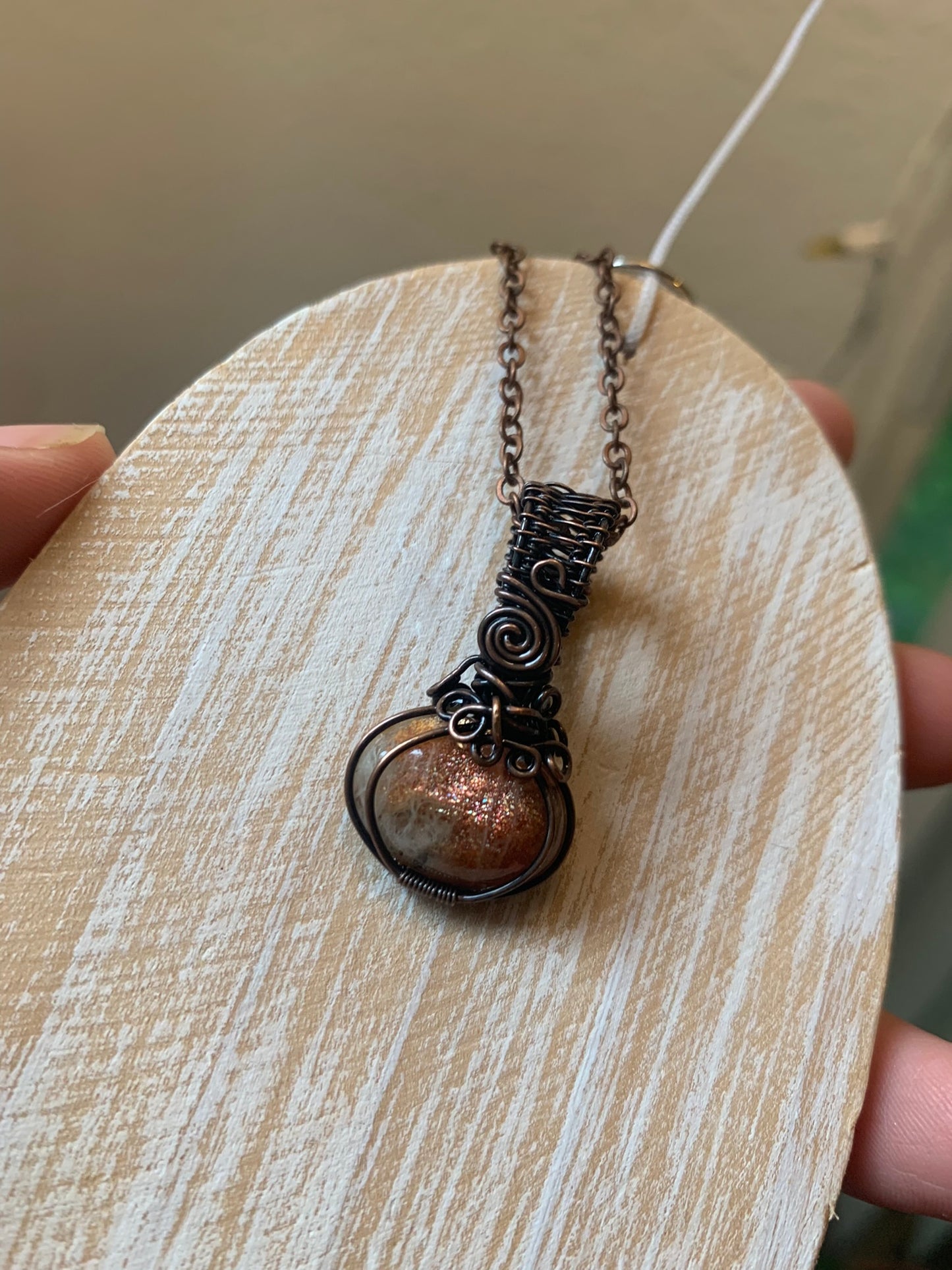 Dainty Sunstone Pumpkin Pendant Wire Wrapped In Antiqued Copper