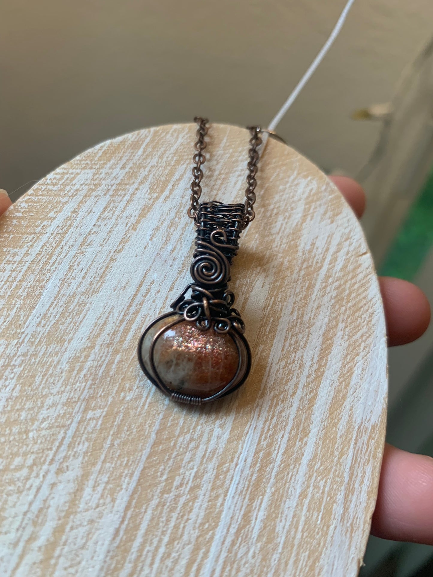 Dainty Sunstone Pumpkin Pendant Wire Wrapped In Antiqued Copper