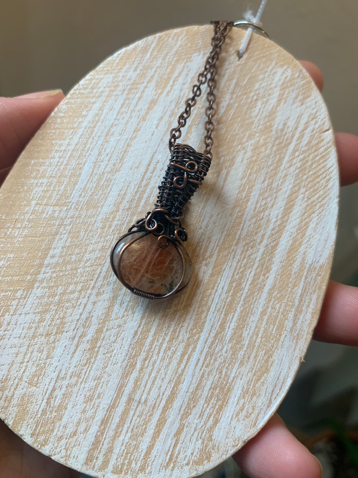 Dainty Sunstone Pumpkin Pendant Wire Wrapped In Antiqued Copper