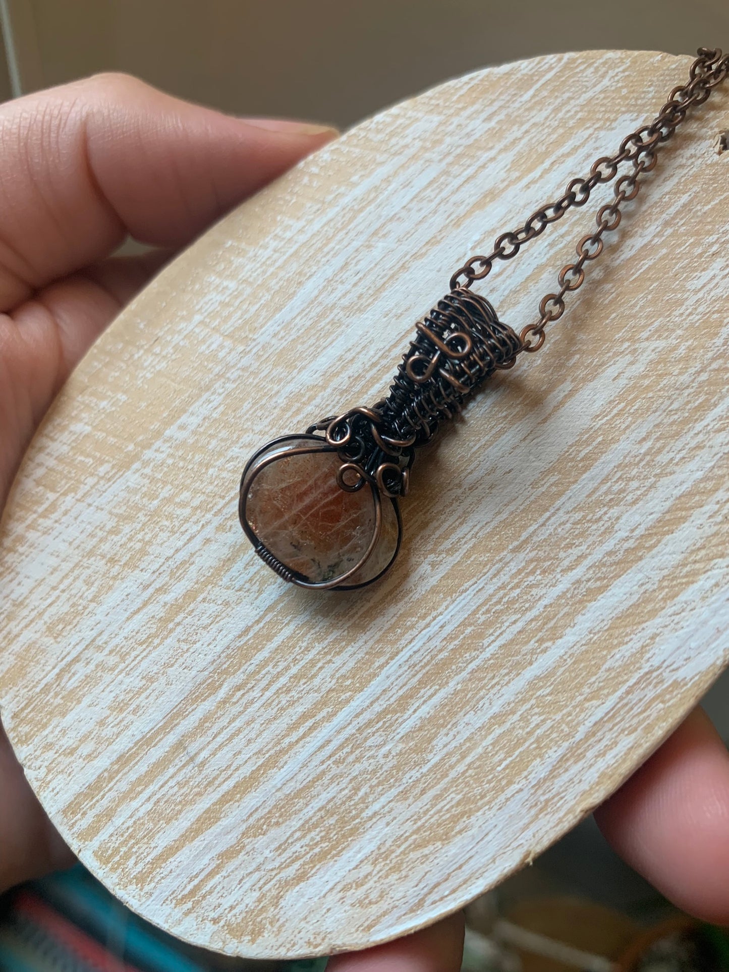 Dainty Sunstone Pumpkin Pendant Wire Wrapped In Antiqued Copper