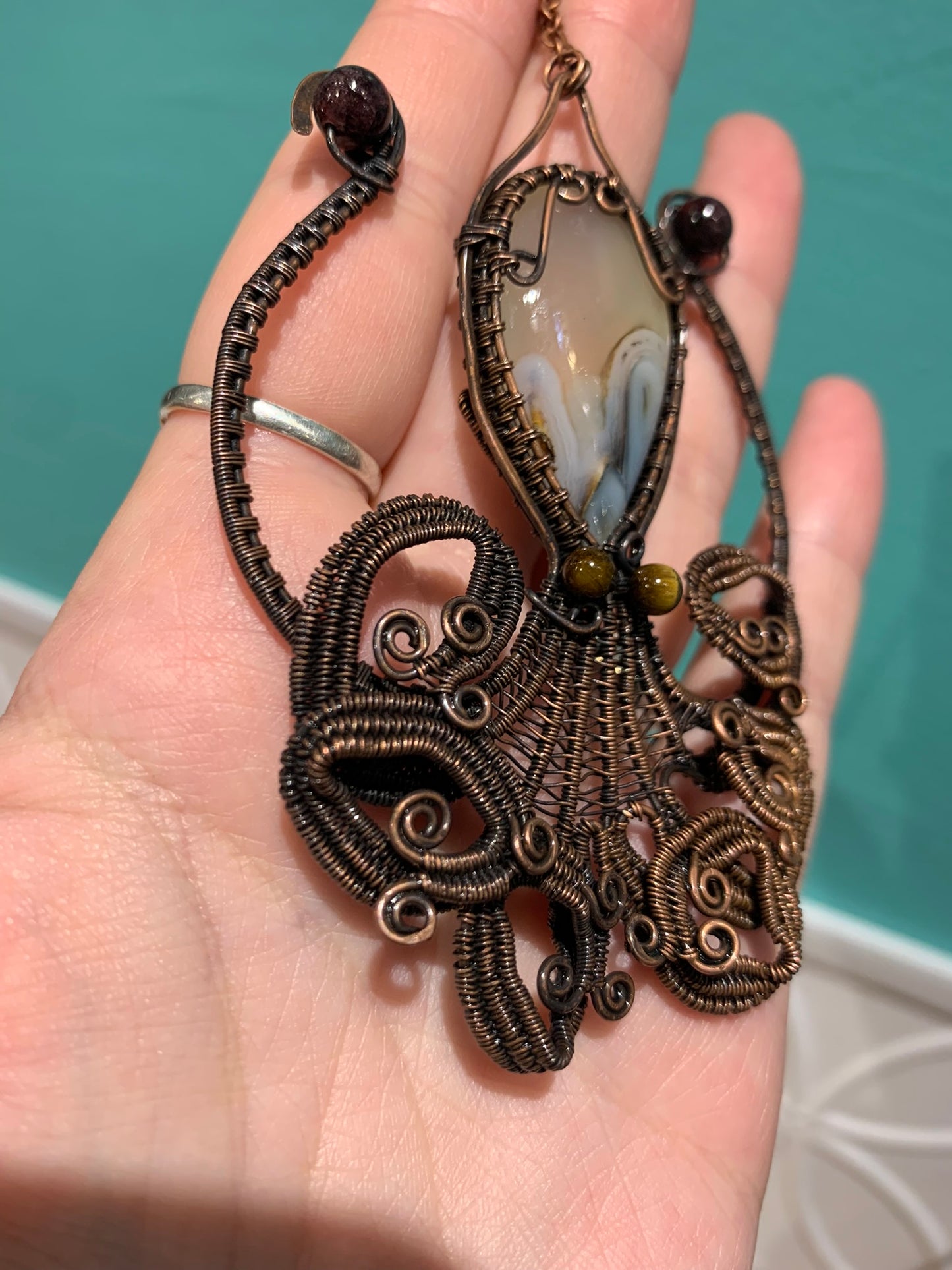 Octopus Wire Wrapped Pendant featuring Dendritic Agate with Tigers eye and garnet accents