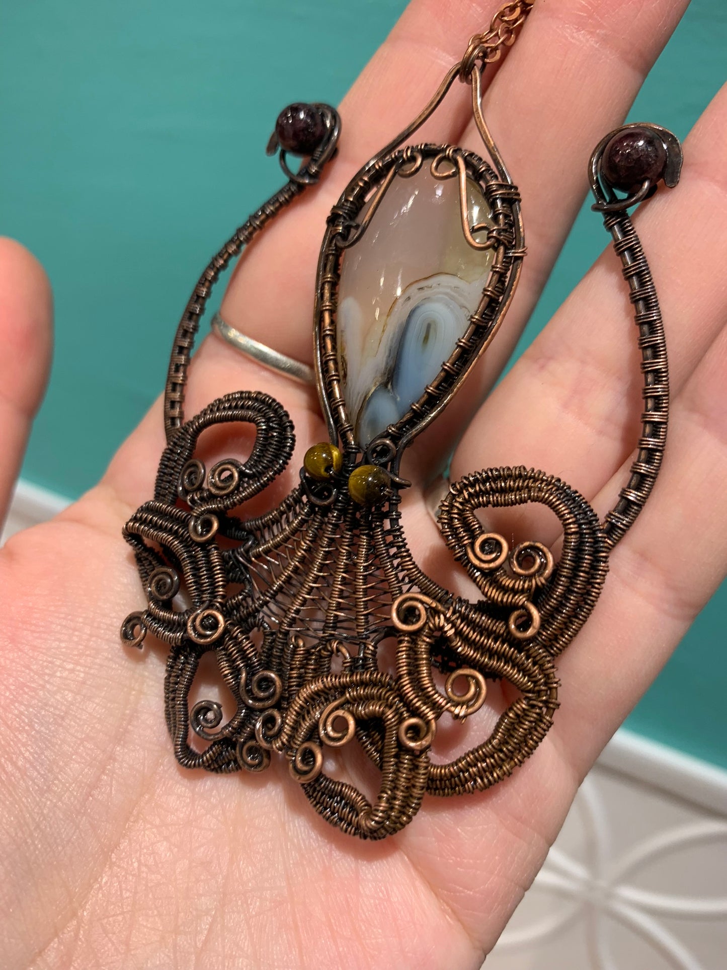 Octopus Wire Wrapped Pendant featuring Dendritic Agate with Tigers eye and garnet accents